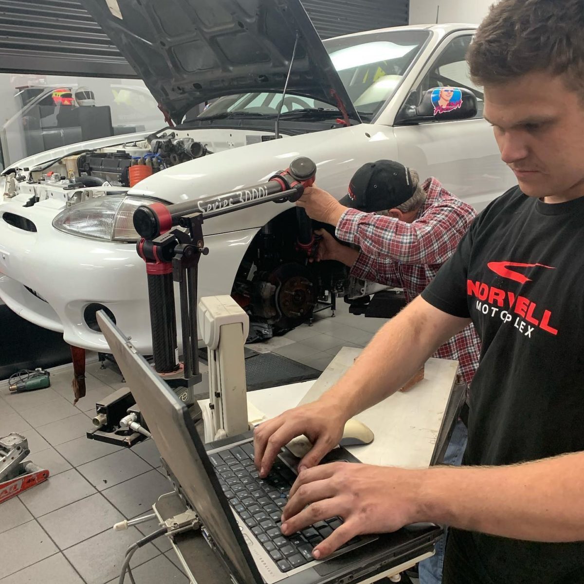 Brodie Kostecki helping to prepare a Hyundai Excel for racing in Townsville in 2020. Image: Brodie Kostecki Instagram