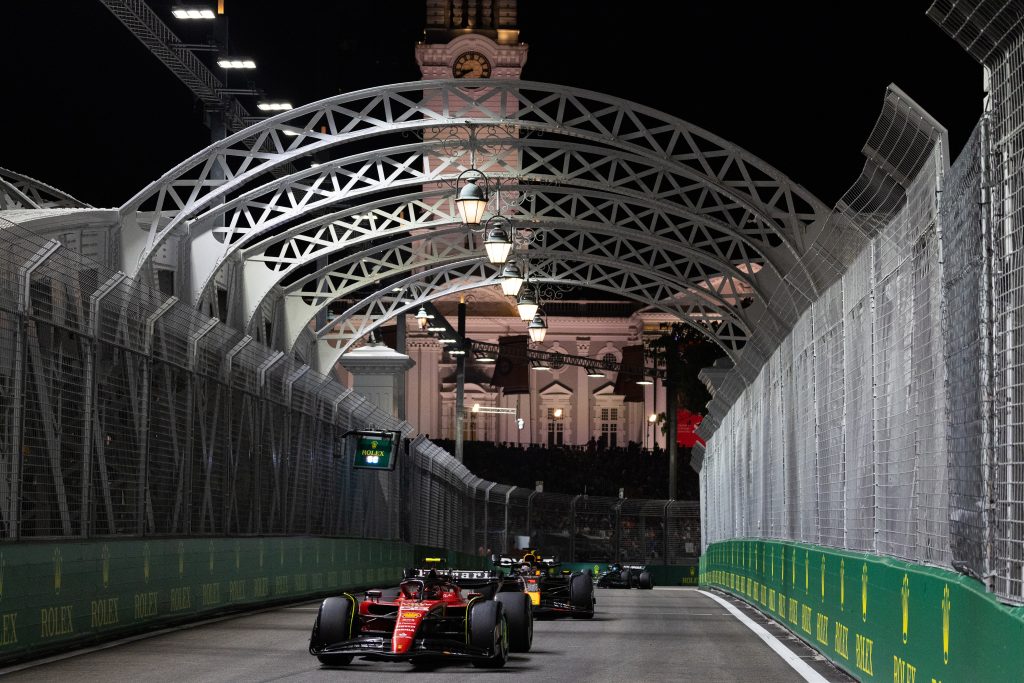 Carlos Sainz delivered a stunning defensive display to take victory under the lights in Singapore