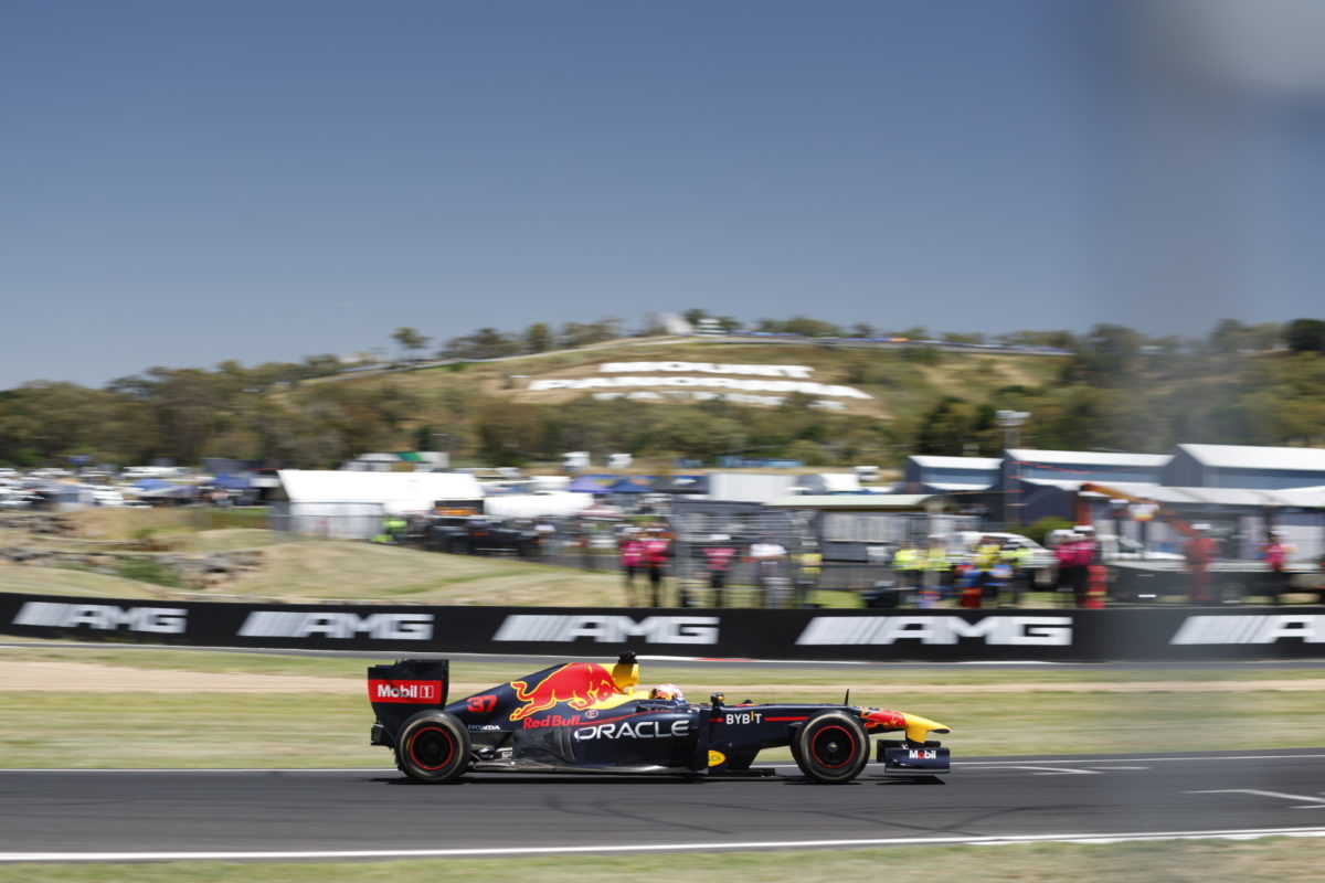 Liam Lawson rounds Hell Corner at Bathurst aboard the Red Bull RB7 F1 car