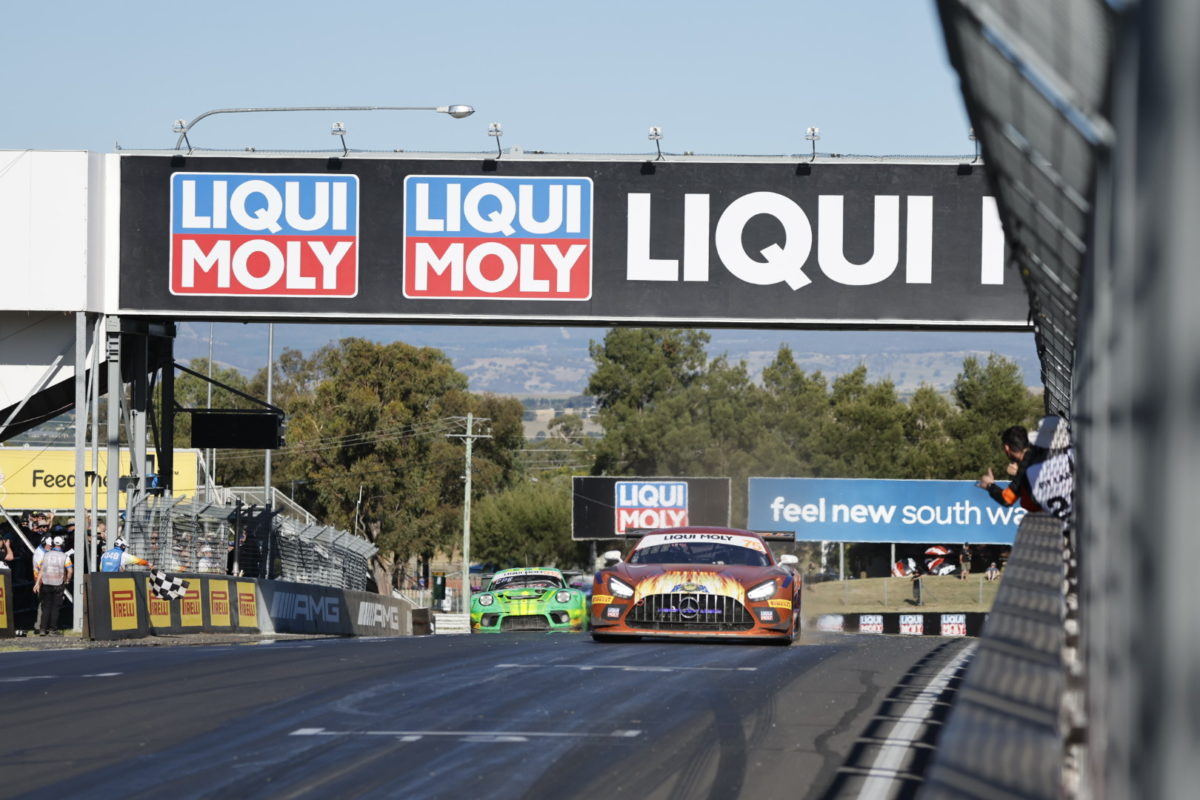 The Manthey EMA Porsche follows the SunEnergy1 Mercedes-AMG across the finish line in the 2023 Bathurst 12 Hour
