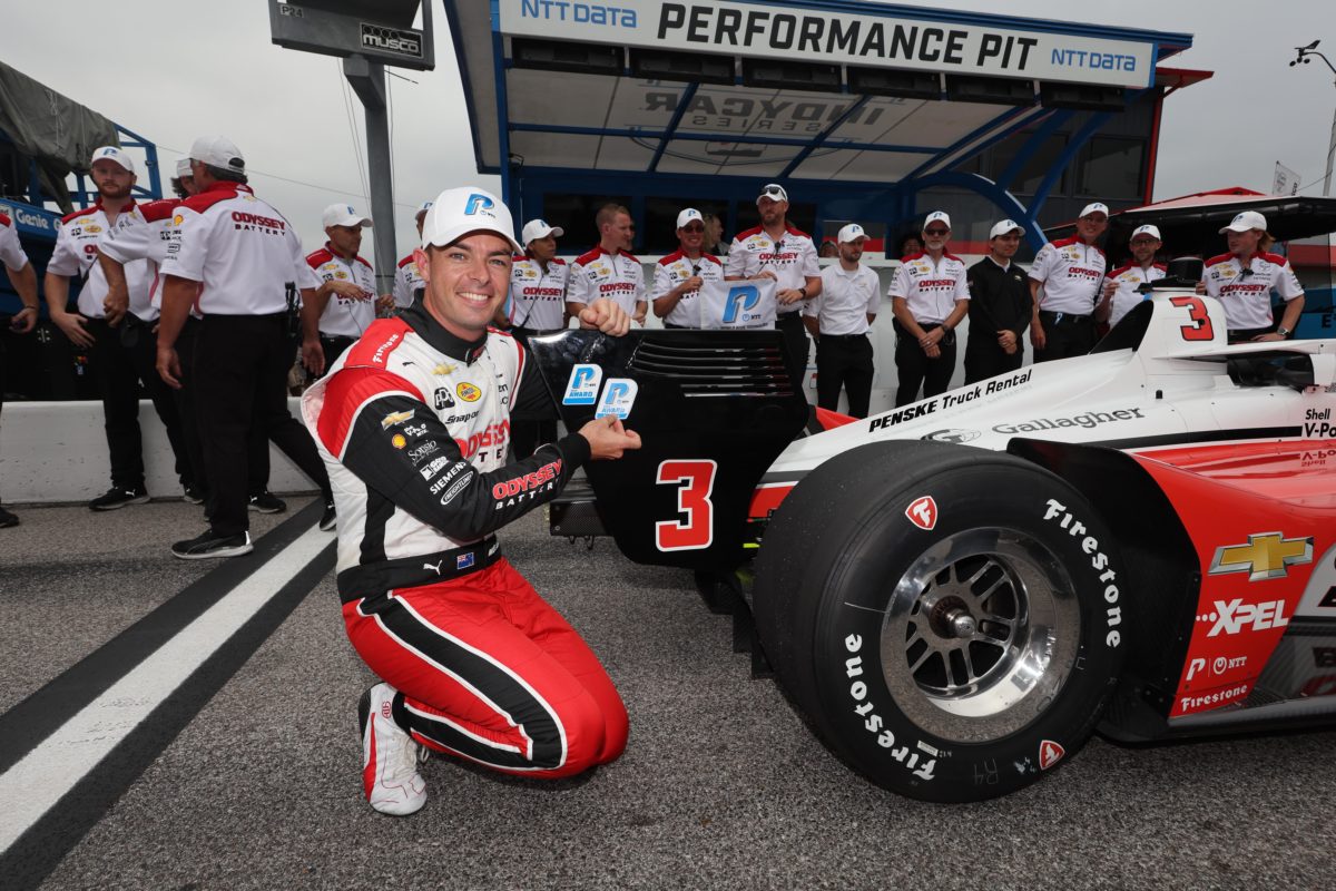 Scott McLaughlin celebrates winning the NTT P1 award for qualifying on pole ahead of the Bommarito Automotive Group 500.