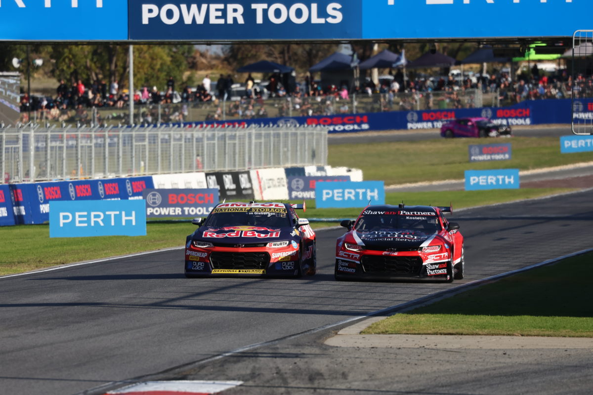 Shane van Gisbergen (left) and Brodie Kostecki (right) in an earlier battle for the lead at Wanneroo Raceway