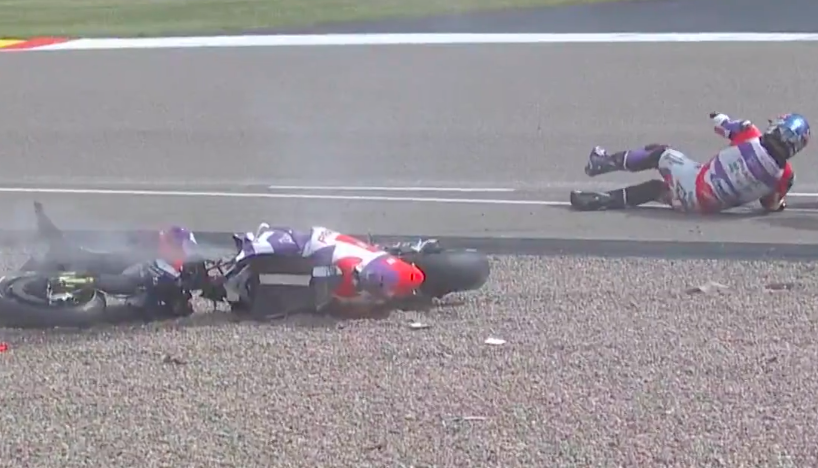 Johann Zarco's bike was ripped in half after a German GP practice crash with Marc Marquez - Image: Screenshot from BT Sport