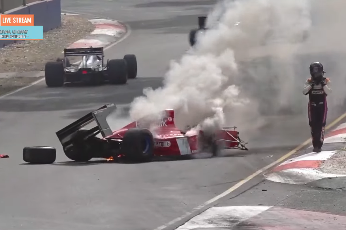 Josh Kean walks away after the crash in the 1994 Footwork FA15. Picture: Adelaide Motorsport Festival live stream