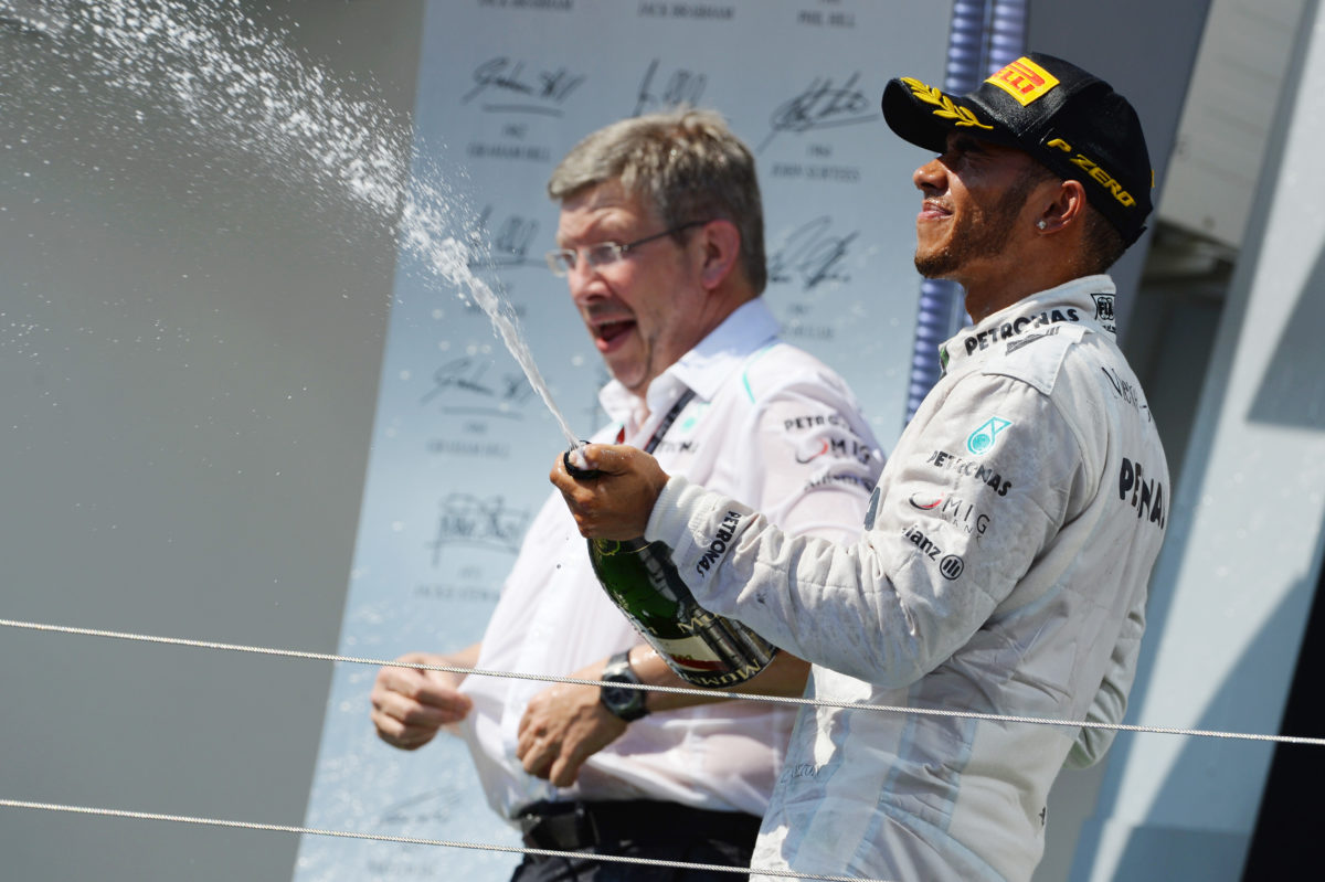 Hamilton celebrates his first win with Mercedes in Hungary in 2013