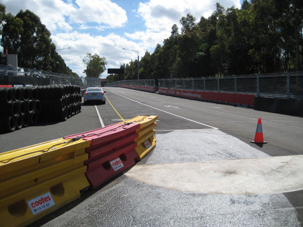 The exit to Turn 1 and the run towards the XXXX Gold Chicane