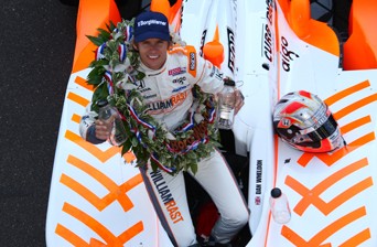 Dan Wheldon celebrates his 2011 Indianapolis 500 victory
