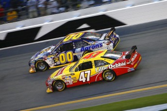 Marcos Ambrose will continue to run as a 