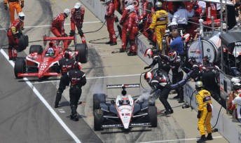 Will Power exits his pit box with his fuel hose still attached at Indy