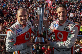Paul Dumbrell and Jamie Whincup with the Peter Brock Trophy