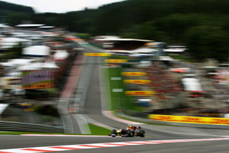 Mark Webber atthe famous Eau Rouge corner at Spa Francorchamps