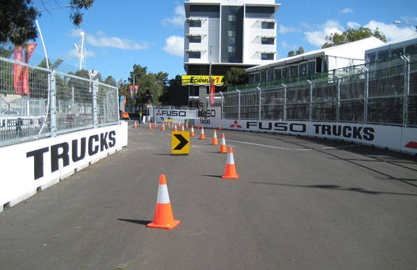 The left-hand Fuso Corner - note that the outside wall on the right slowly comes in, making it a gradual left turn-in as the cars head towards the apex