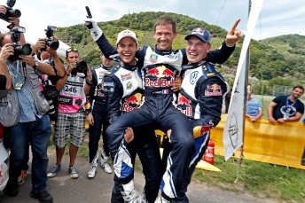 Ogier celebrates with Mikkelsen and Latvala