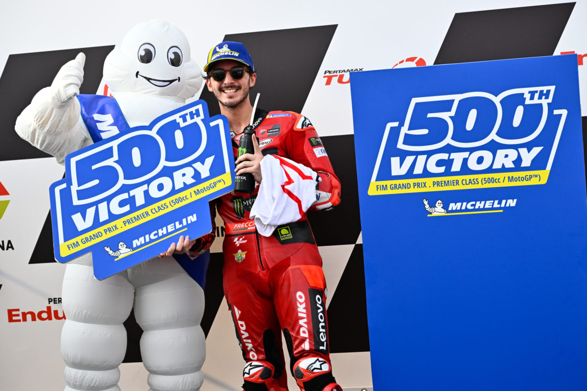 Bibendum and Francesco Bagnaia celebrate Michelin's 500th MotoGP race win. Image: Supplied