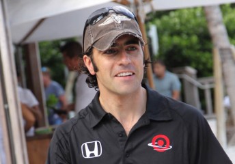 2010 IZOD IndyCar Series champion Dario Franchitti celebrates poolside in Miami