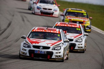 The four Walkinshaw Racing-built Commodores running line-astern at Barbagallo