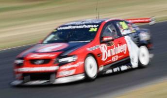 Fabian Coulthard in the 2010-spec Bundaberg Red Racing Commodore VE