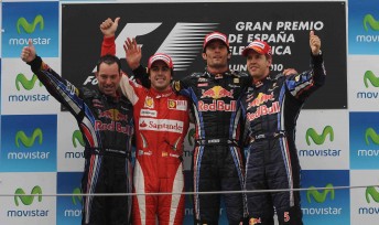 Fernando Alonso on the Spanish podium with his Red Bull counterparts