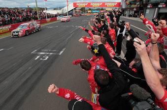 Garth Tander crosses the line to win the 2011 Bathurst 1000