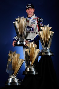 Jimmie Johnson and his four Sprint Cup Series championship trophies