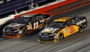thumb Denny Hamlin, left, races Jeff Burton at Darlington