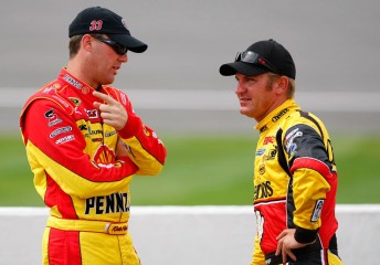 Clint Bowyer, right, speaks with Richard Childress Racing team-mate Kevin Harvick
