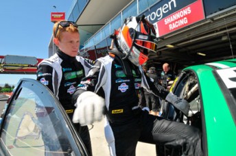 Jesse Dixon helps Cameron Waters into the #23 Commodore at Mount Panorama