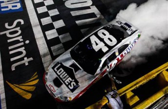 thumb Jimmie Johnson celebrates his third All-Star victory