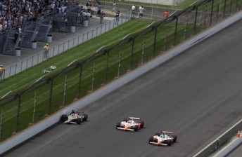 Wheldon (centre) slipped by the wrecking JR Hildebrand to win the 500