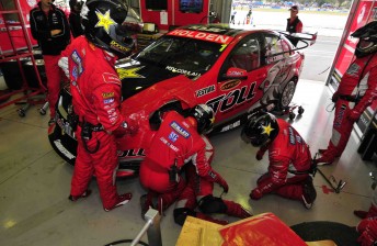 The Tol Holden Racing Team crew work on James Courtney