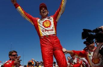 Helio Catroneves celebrates his first IndyCar win since October 2010