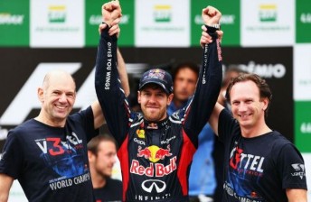 Vettel celebrates with Adrian Newey and Christian Horner after Sunday