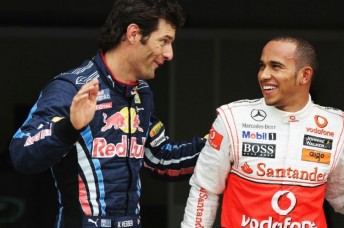 Mark Webber with pole-sitter Lewis Hamilton