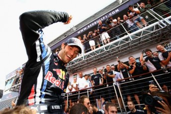 Mark Webber celebrates after his first British Grand Prix win