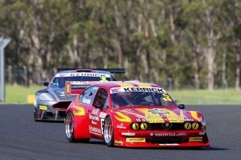 Ricciardello leads Baily through Turn 7