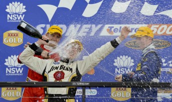 Lee Holdsworth (left), James Courtney and Steven Richards celebrate