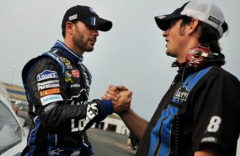 thumb Jimmie Johnson and a crew member from his #48 team
