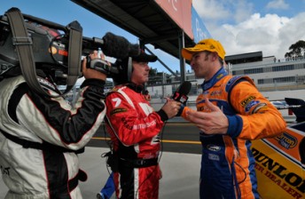 V8 television pit lane reporter Mark Larkham speaks to Will Davison