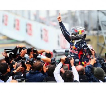 Sebastian Vettel celebrates sealing his third straight F1 world title at Sao Paulo last year