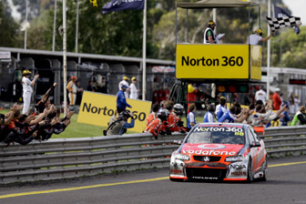Jamie Whincup crosses the line to win Sunday