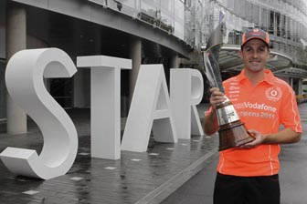 Jamie Whincup with his V8 championship trophy