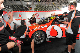 Craig Lowndes with his TeamVodafone squad at the AGP