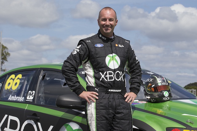 The suit Marcos Ambrose wore for his return to V8 Supercars following his nine-year NASCAR is being auctioned for charity on Speedcafe.com Classifieds
