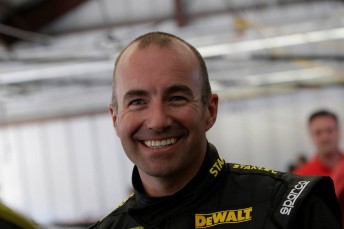 Smiles for  Marcos Ambrose despite an engine glitch