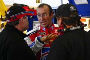 Marcos Ambrose and his JTG Daugherty Racing team in the Sprint Cup garage