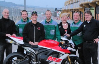 Ant West in happier days with the MZ Moto2 team who he claims is yet to pay him for 2011 (Pic: Facebook)