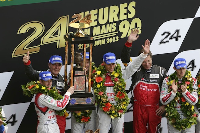 Allan McNish (left) on the podium after winning Le Mans last year with Tom Kristensen and Loic Duval 
