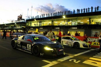 The Team Joest Audis sit on the grid before the start