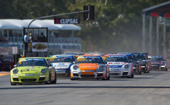 Craig Baird leads Nick Percat and the remainder of the Porsche pack into Turn 1 in Adelaide