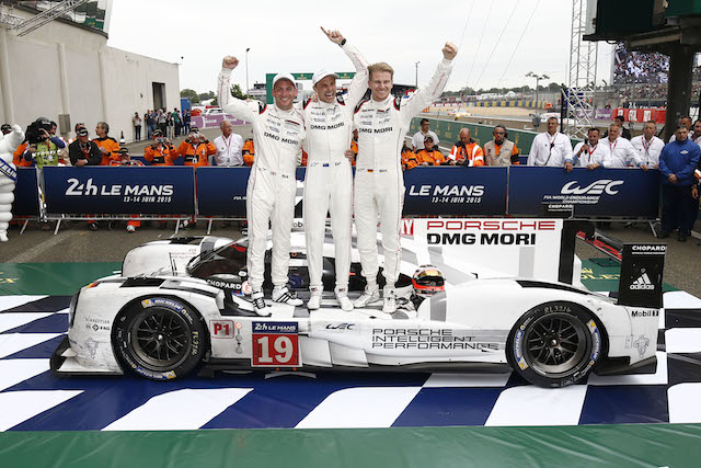 Bamber, flanked by Nick Tandy (left) and Nico Hulkenberg celebrating their Le Mans 24 Hour triumph